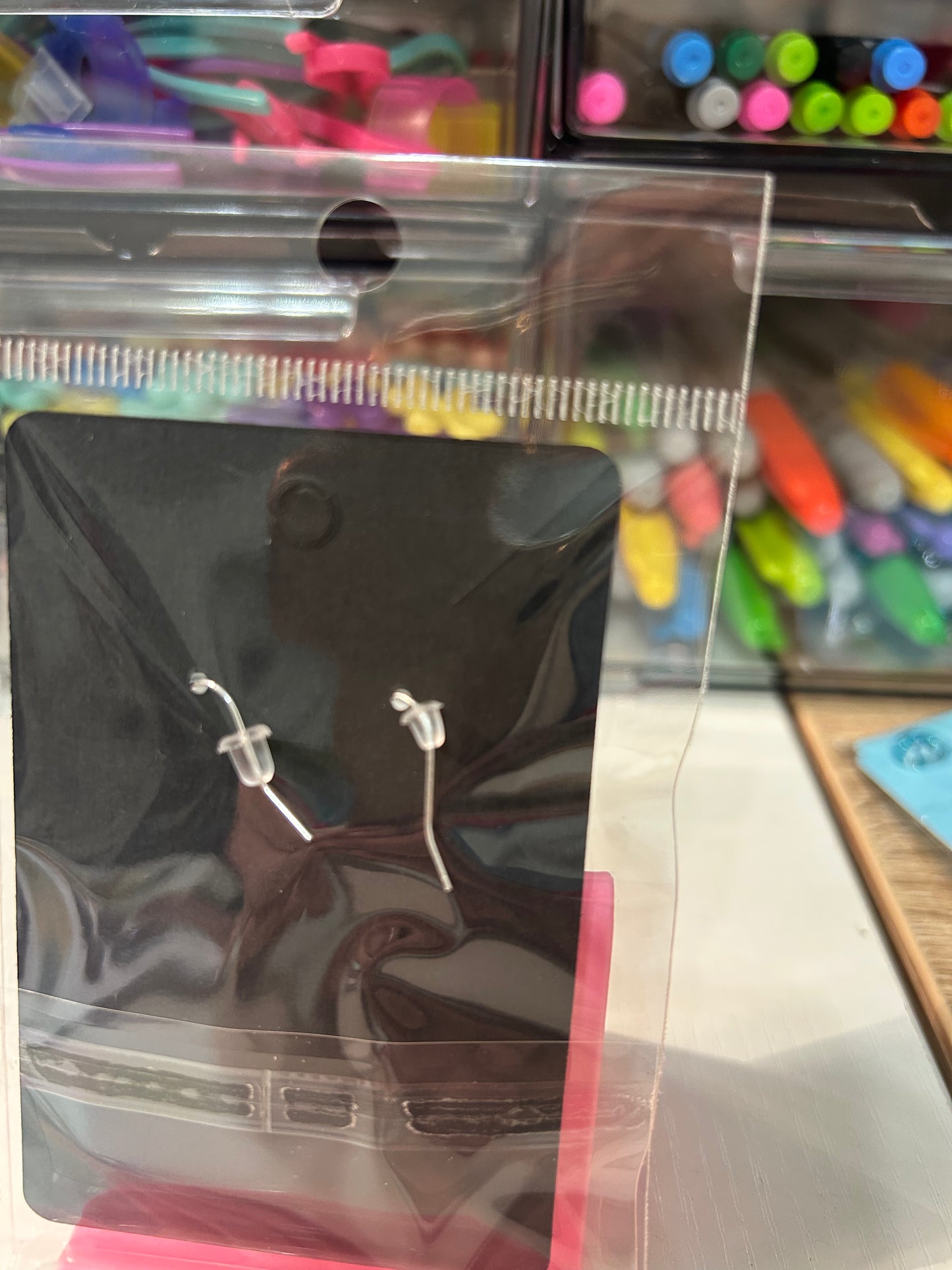 Gold and silver sparkle earrings.